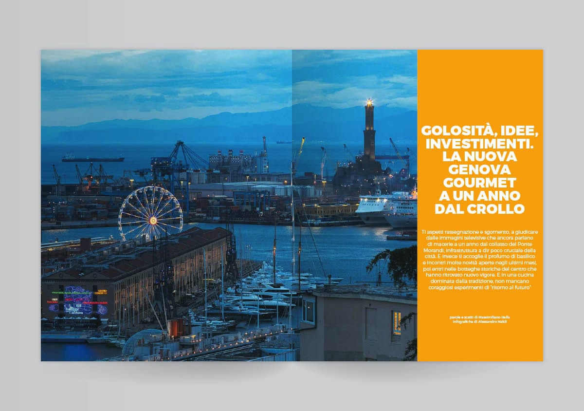Genova vista dall'alto, di sera, sulle pagine del Gambero Rosso