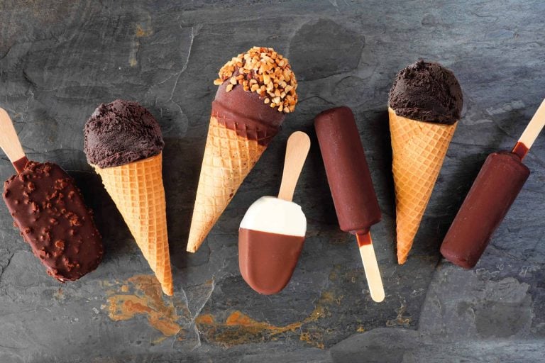 Variety of chocolate ice cream desserts. Overhead view scattered on a dark slate background.|capriccetto caprice