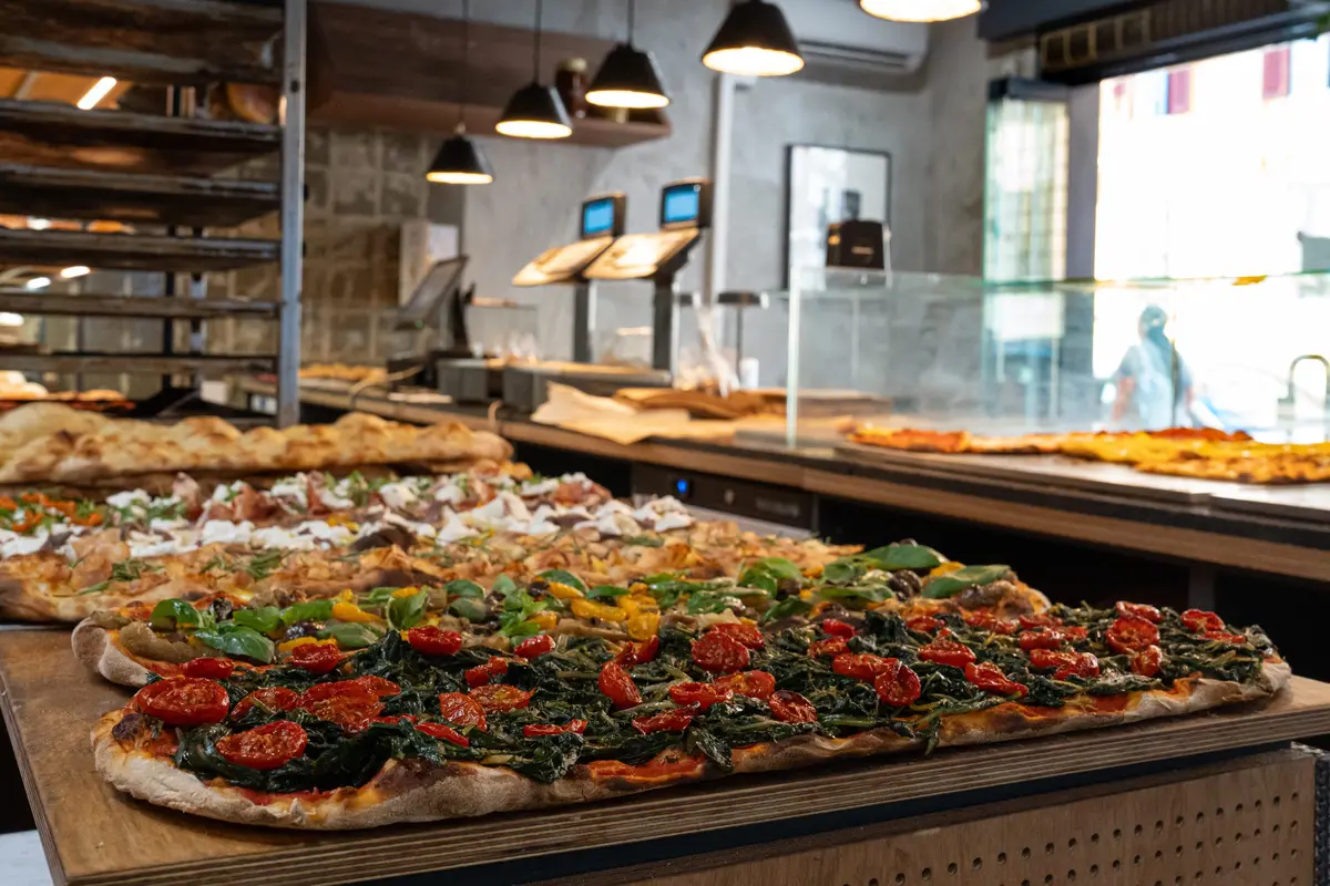 Uno dei più bravi panificatori romani apre un forno con pizza al taglio in zona Vaticano (che la sera diventa wine bar)