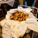 Faraona alla creta servita nella storica trattoria Antico Pavone nella pianura cremonese