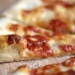 NY-style-pizza-slice1-1024x624 1