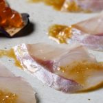 zuma_thinly sliced seabass with yuzu truffle oil and salmon roe - suzuki no sashimi crop